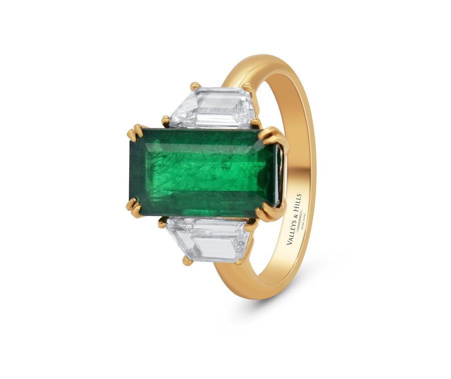Emerald with Trapezoid Side Stones on Yellow Gold Setting
